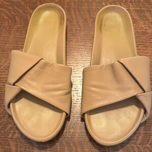 Gently worn Beek Sandals.